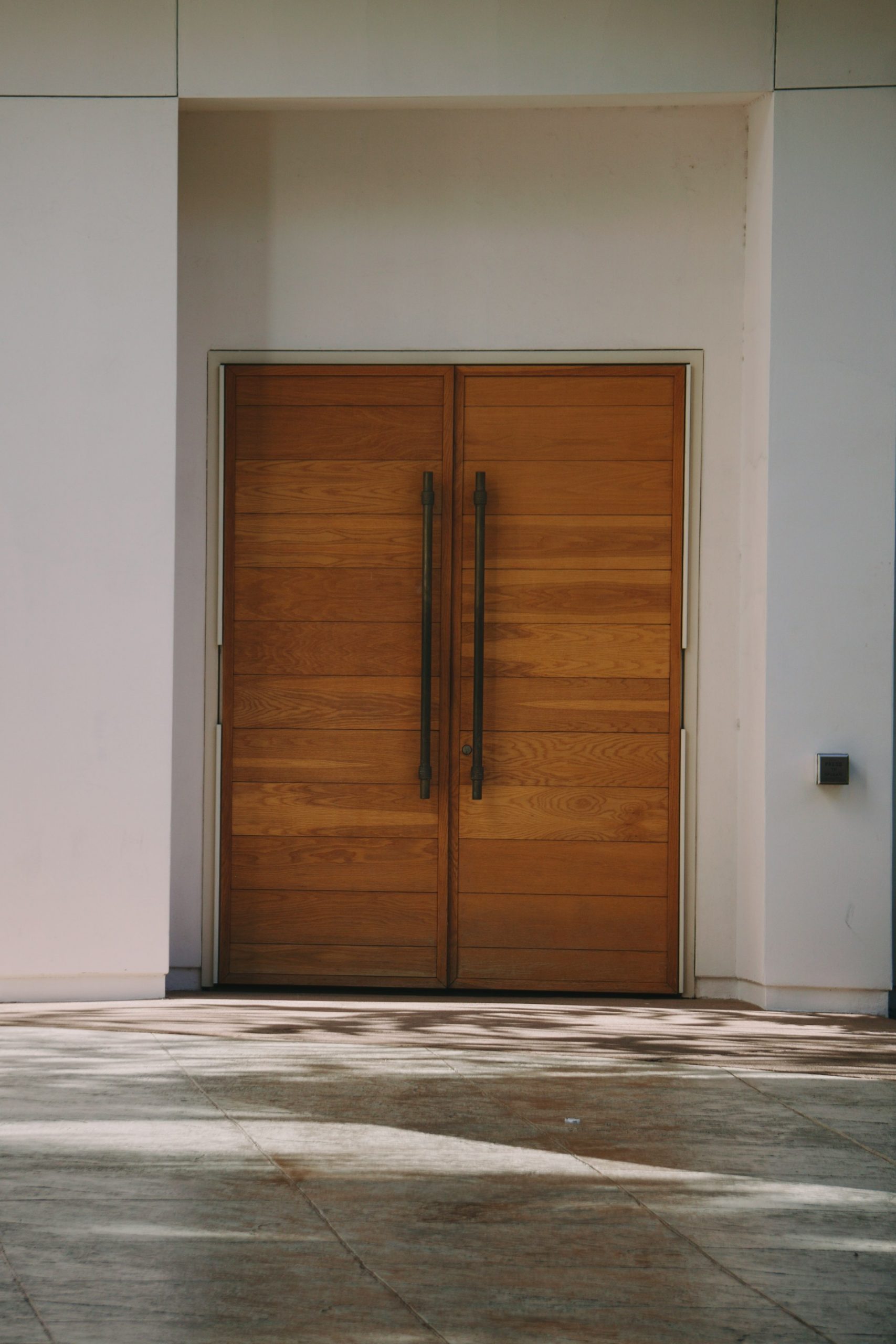 Elegant raised panel interior door in natural wood finish