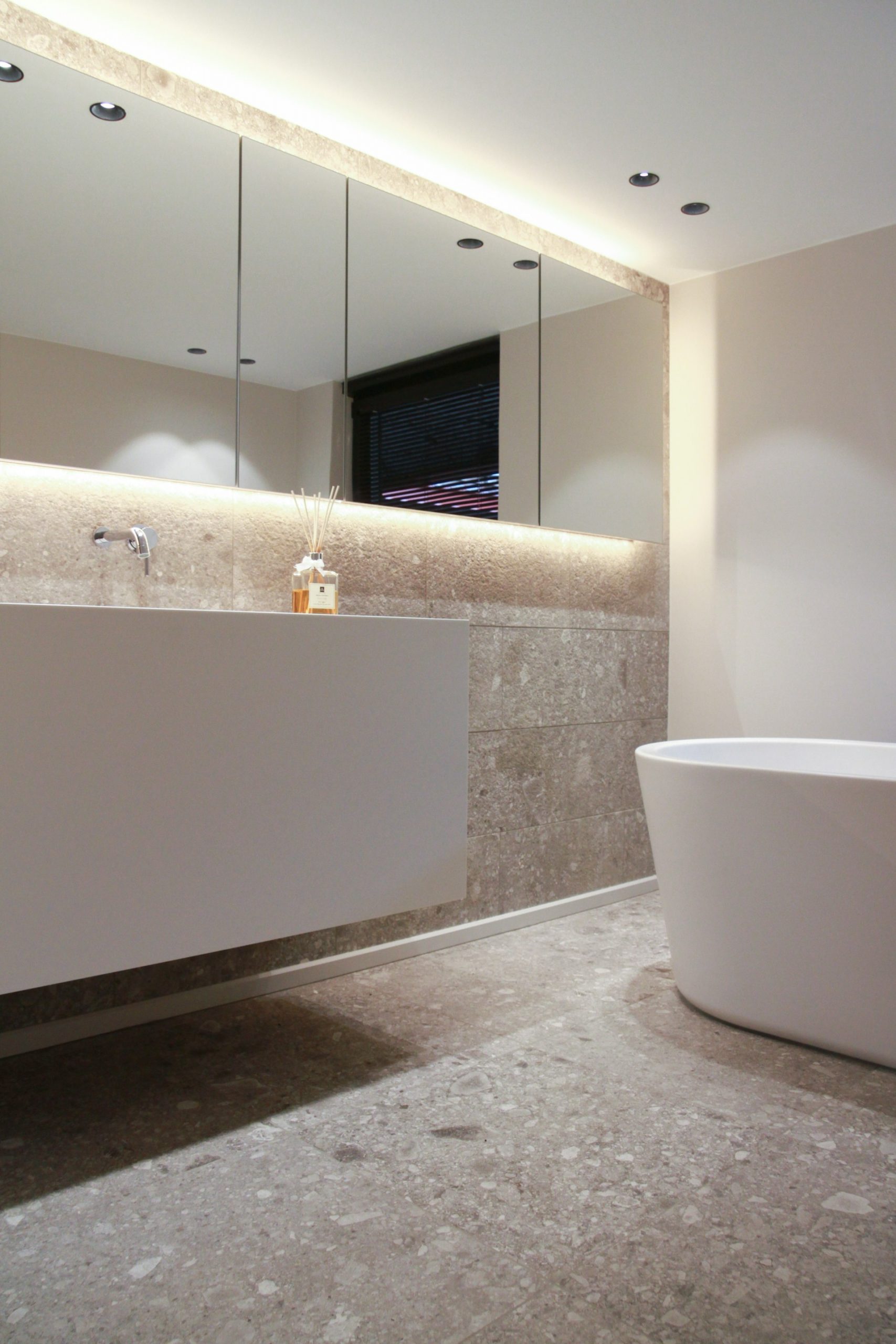 Premium large format porcelain floor tiles in a modern open-plan interior