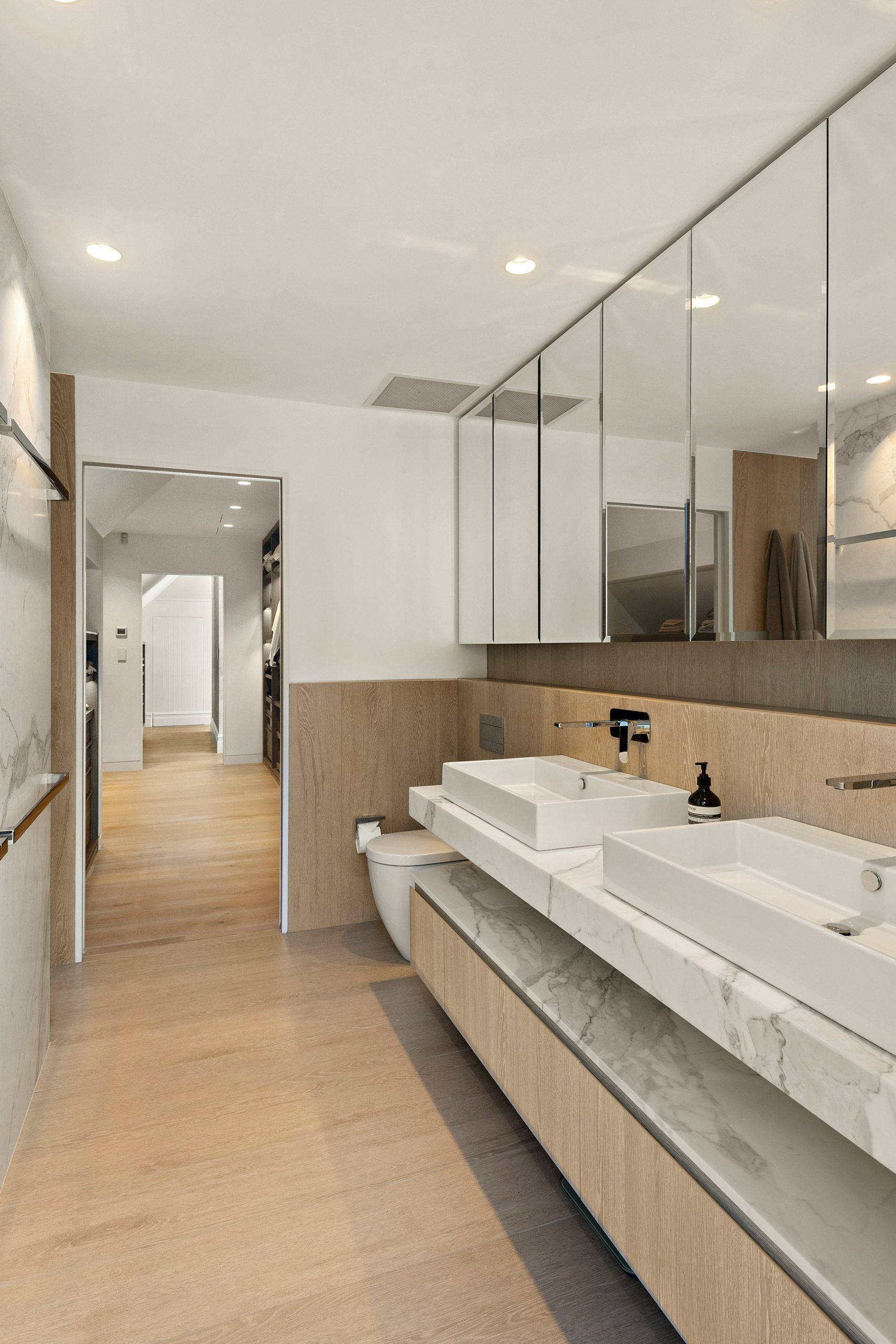 Luxury bathroom and wet room with premium porcelain and natural stone floor tiles