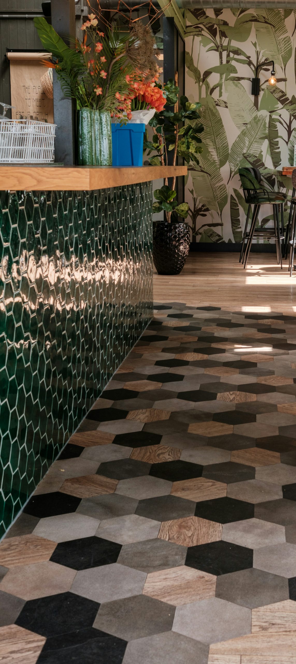 Porcelain wood-effect plank tiles creating a seamless luxury floor