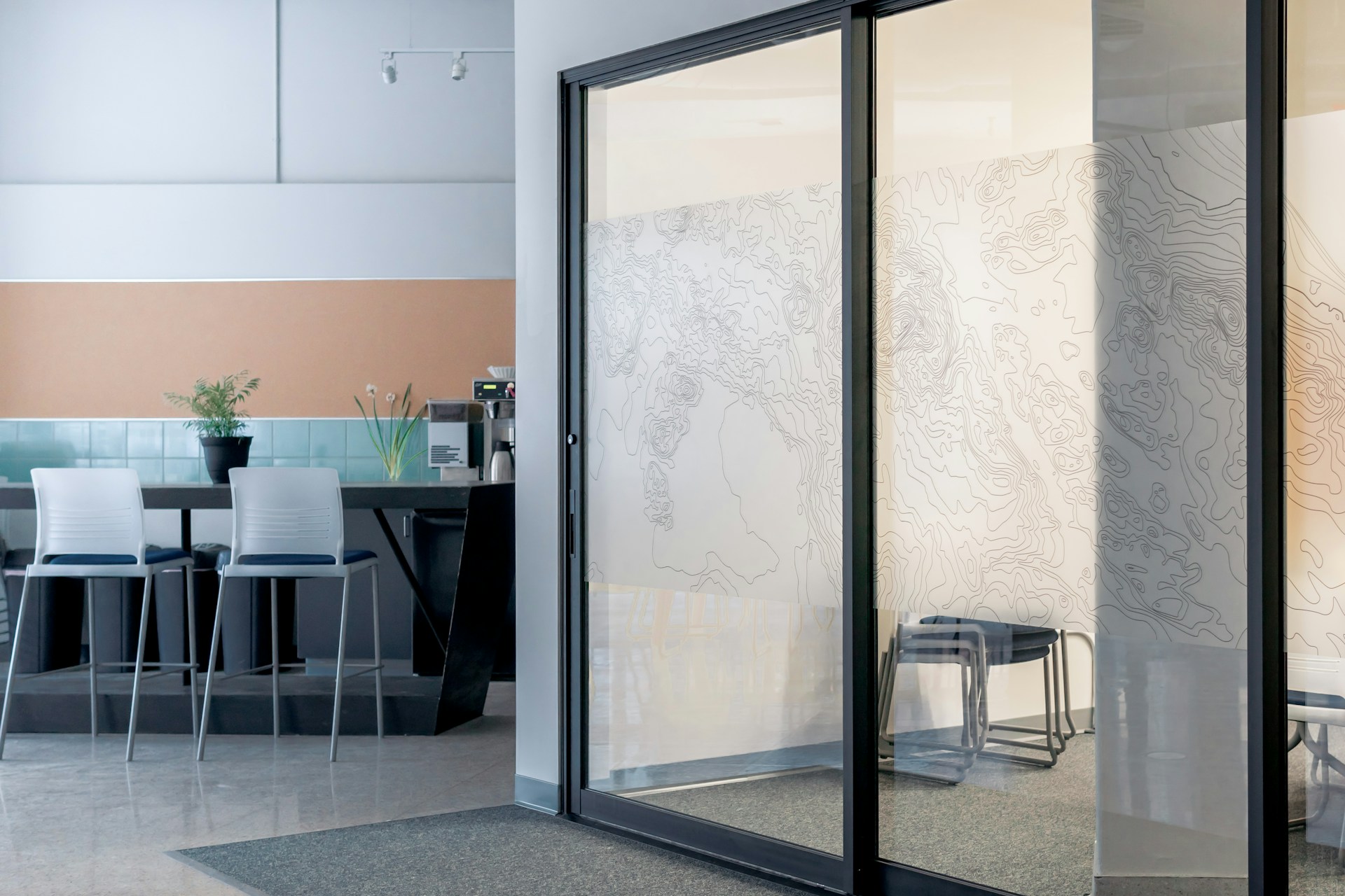 Glazed interior door flooding a hallway with natural light